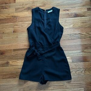 Black romper gently used in great condition.